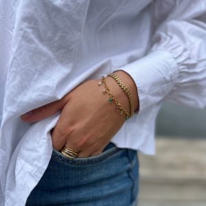 Armbånd i forgyldt stål med ædelsten